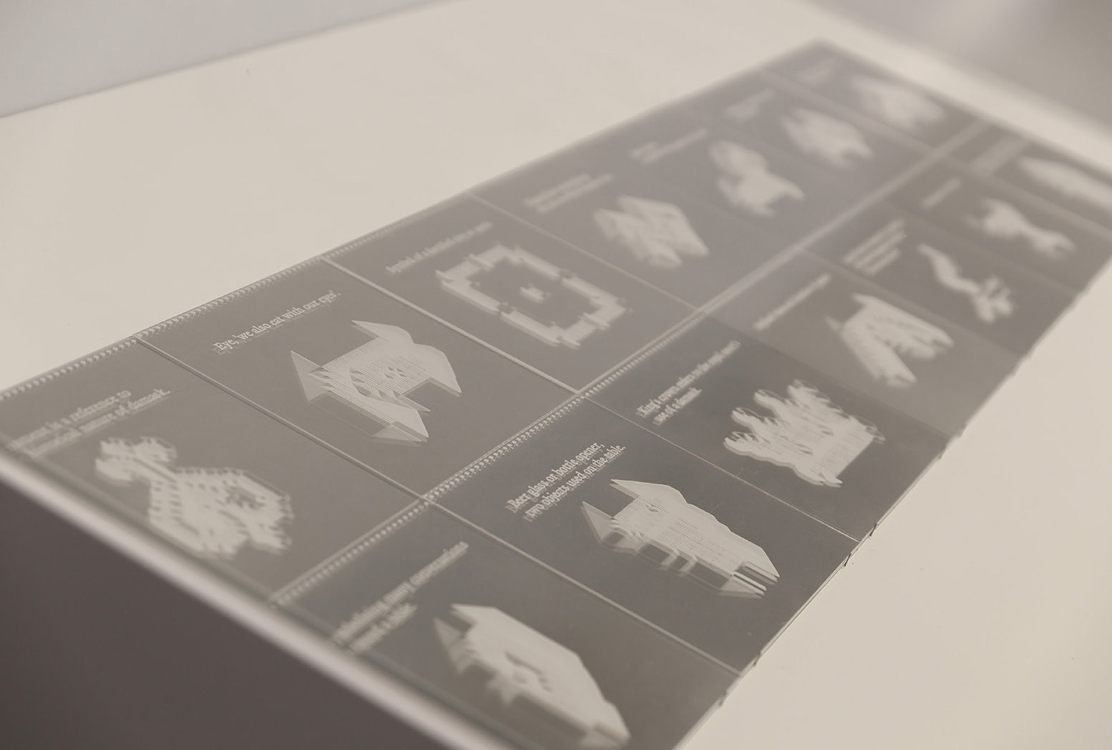 Installation view showing tapestry and LED screens together.